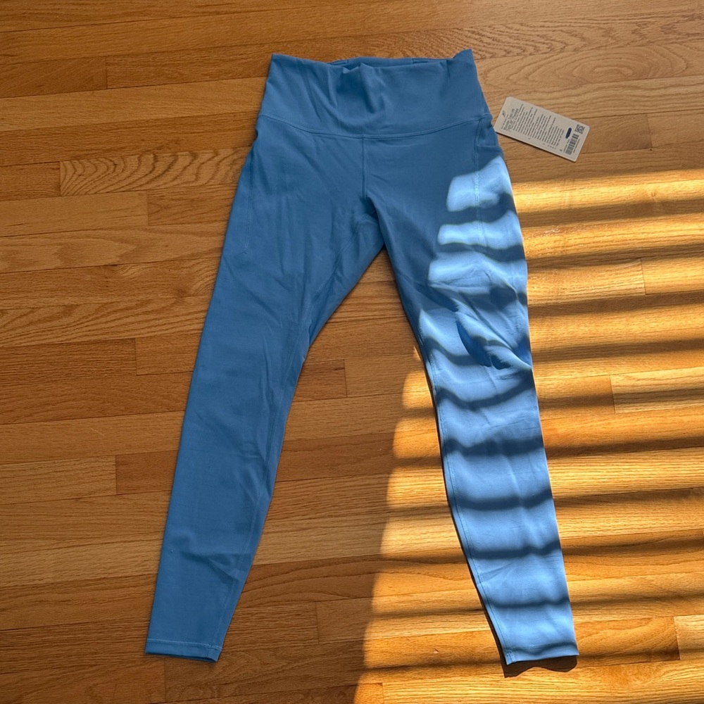 Lululemon- Wunder train hr tight 28” pockets
